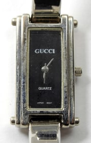 1 SILVER TONE GUCCI WATCH