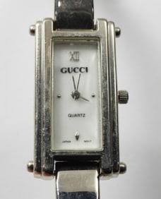 1 SILVER TONE GUCCI WATCH