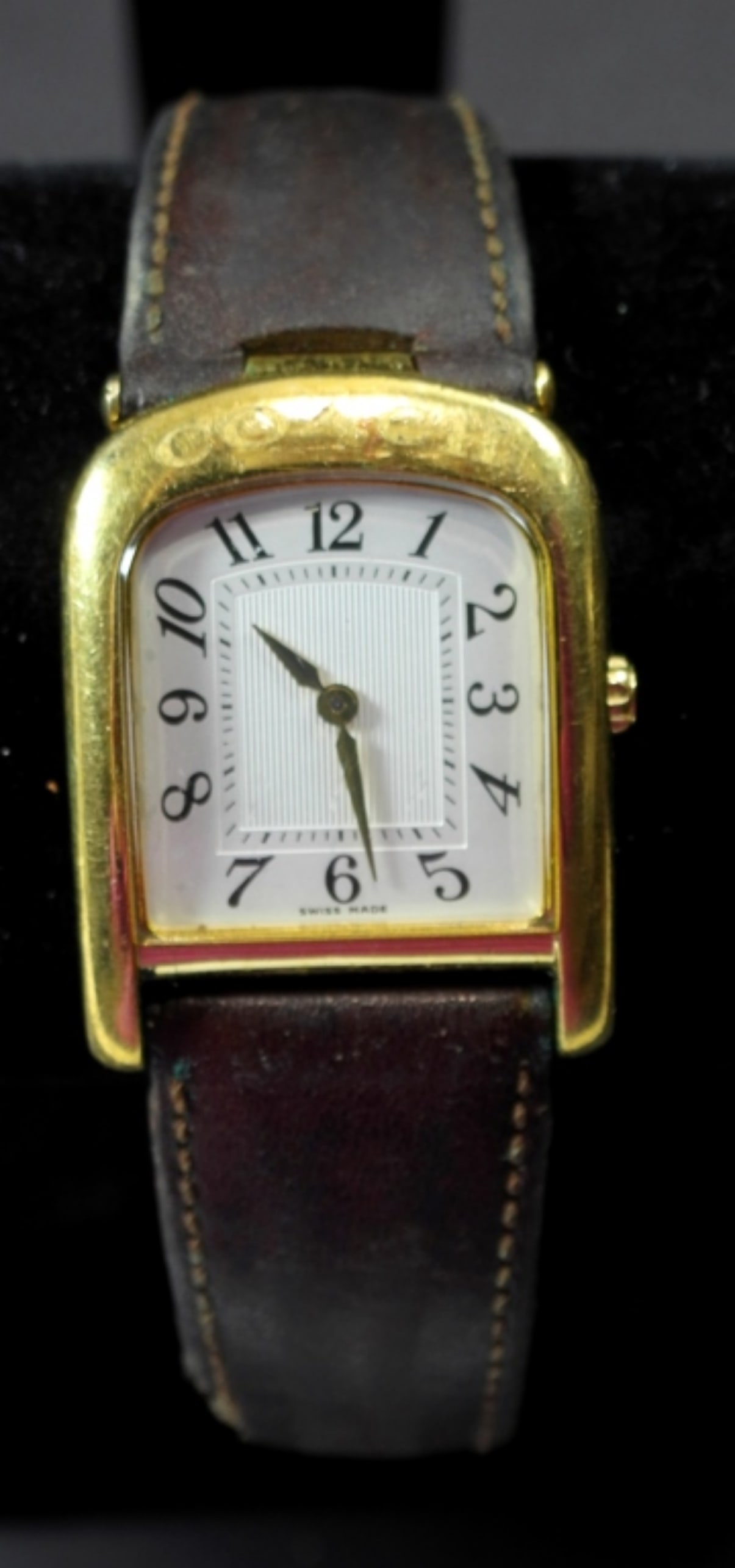 COACH LEATHER BAND WATCH: COACH LEATHER BAND WATCH, SOME TEARING ON THE BAND OF WATCH, UNTESTED, WATCH MAY OR MAY NOT WORK, COULD BE USED FOR PARTS OR REPAIR