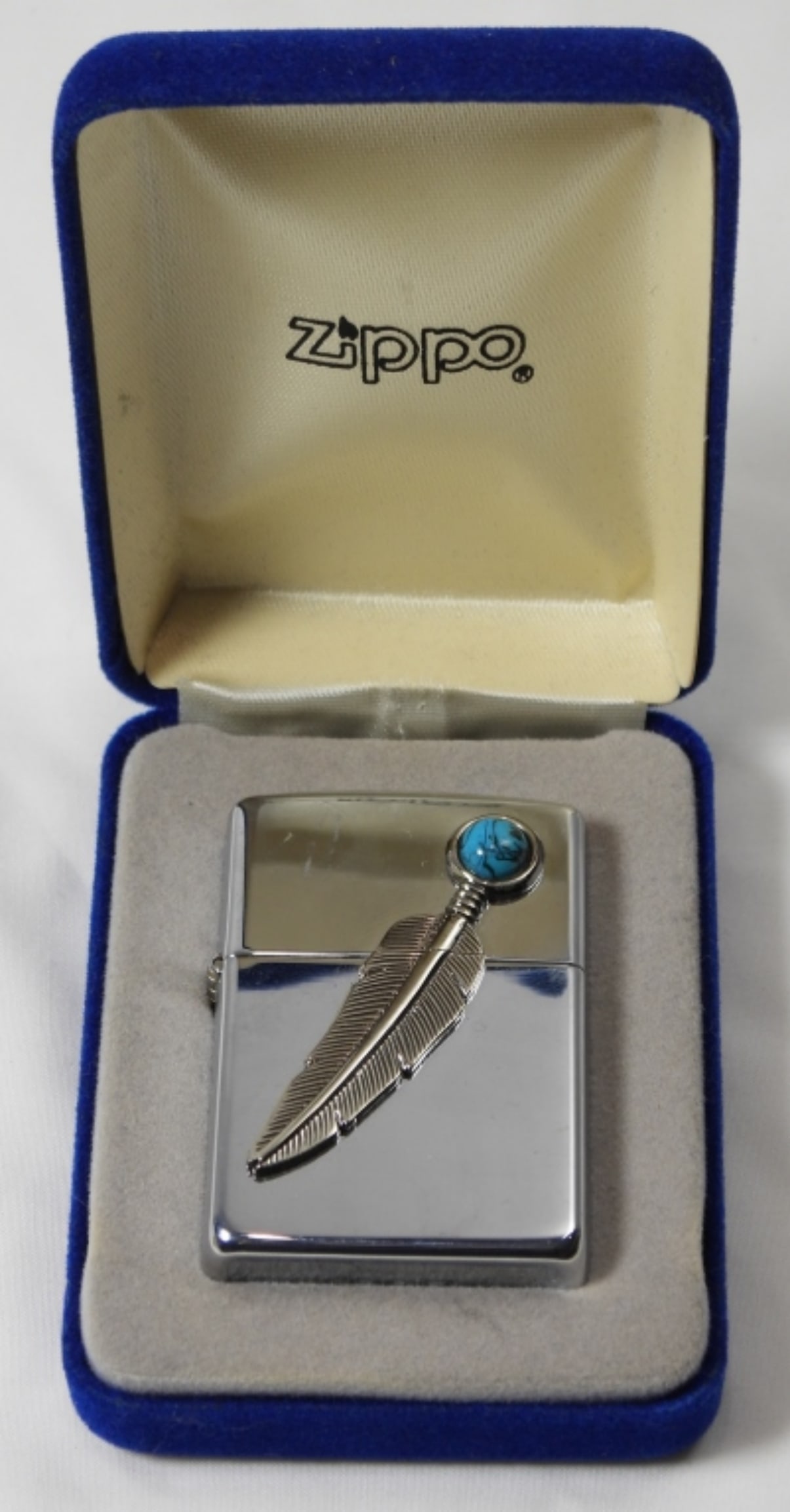 1996 SEALED INDIAN FEATHER TURQUOISE ZIPPO: IN A VELVET ZIPPO CASE, SEALED, 1996