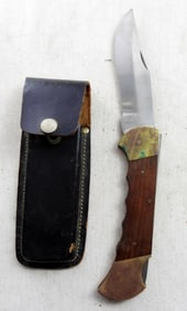 LG  5" BLADE HUNTING KNIFE IN A LEATHER SHEATH