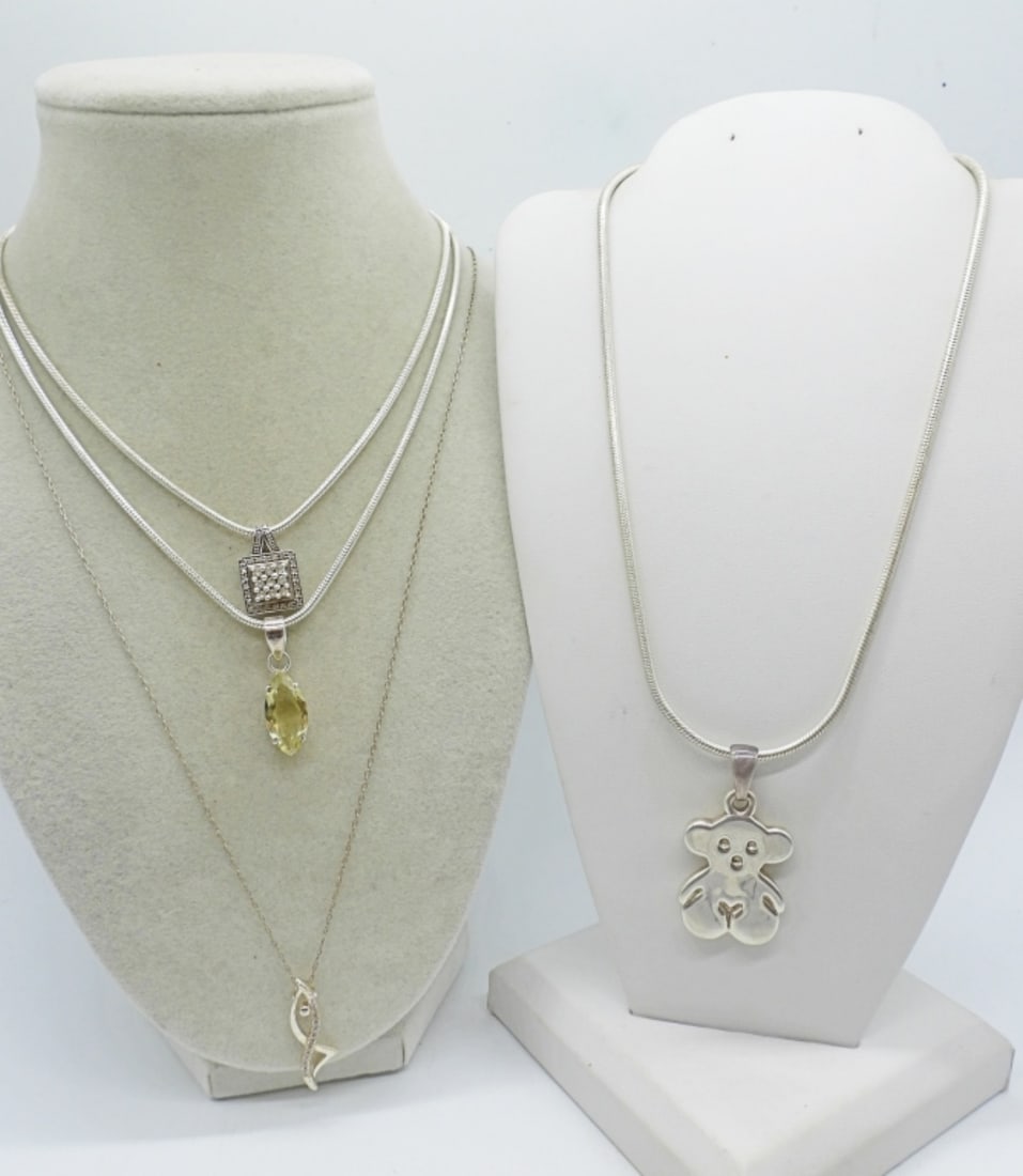 (4) STERLING FASHION NECKLACES: FOUR STERLING 18"-22" FASHION NECKLACES WITH PENDANTS. (29.2 DWT)