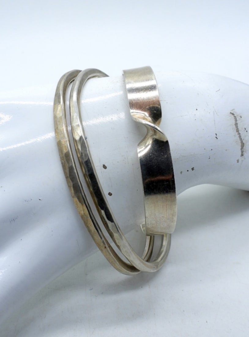 VTG TAXCO STERLING BRACELET: VINTAGE TAXCO STERLING TWIST CUFF BRACELET. MARKED " 925 CMV TAXCO". 7". OTHER TWO BANGLES ARE 8". (32 DWT)