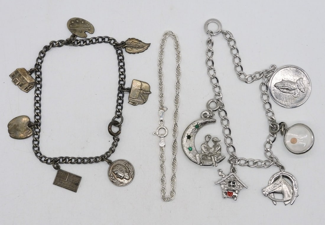 VINTAGE STERLING CHARM BRACELETS: TWO VINTAGE STERLING CHARM BRACELETS, 6" & 8". ONE STERLING CHAIN BRACELET, 7". (23 DWT)