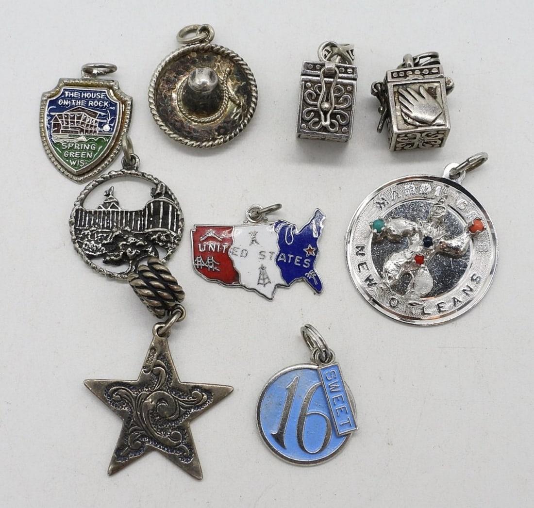 (9) STERLING CHARMS: NINE STERLING CHARMS FOR A CHARM BRACELET OR NECKLACE. (21 DWT)