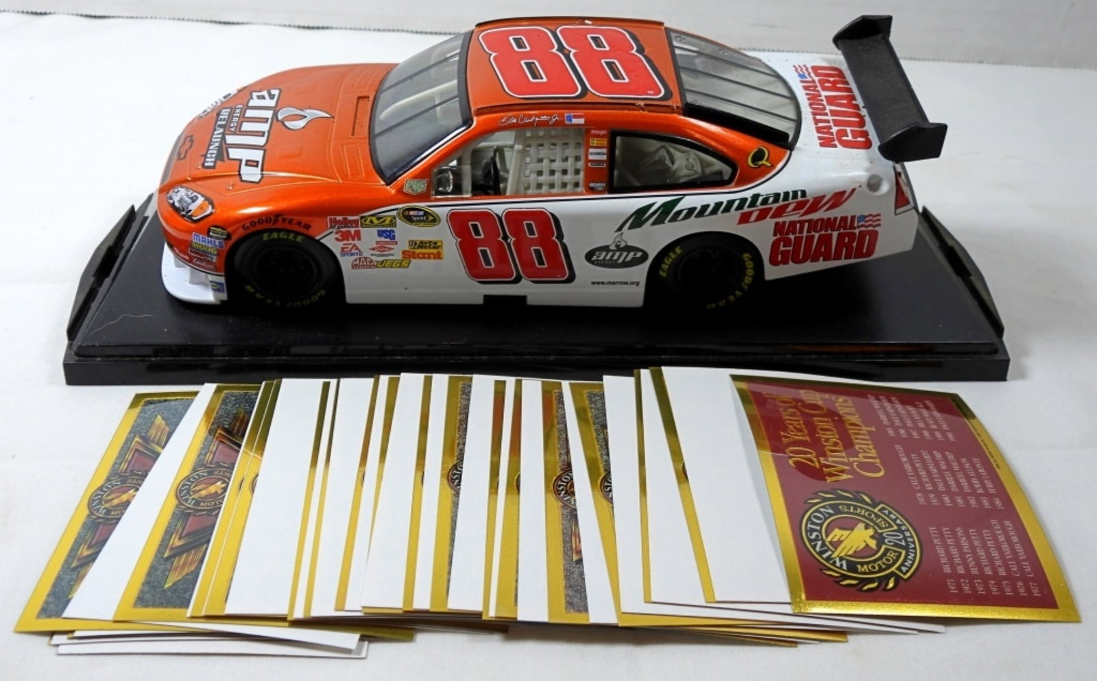 NASCAR #88 MOTORSPORTS DIE-CAST CAR: LOOKS LIKE 1:24 SCALE in ACRYLIC CASE plus 20 YEARS of WINSTON CUP CHAMP CARDS GOLD FOIL