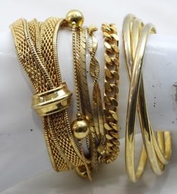 7 GORGEOUS GOLD TONED BRACELETS