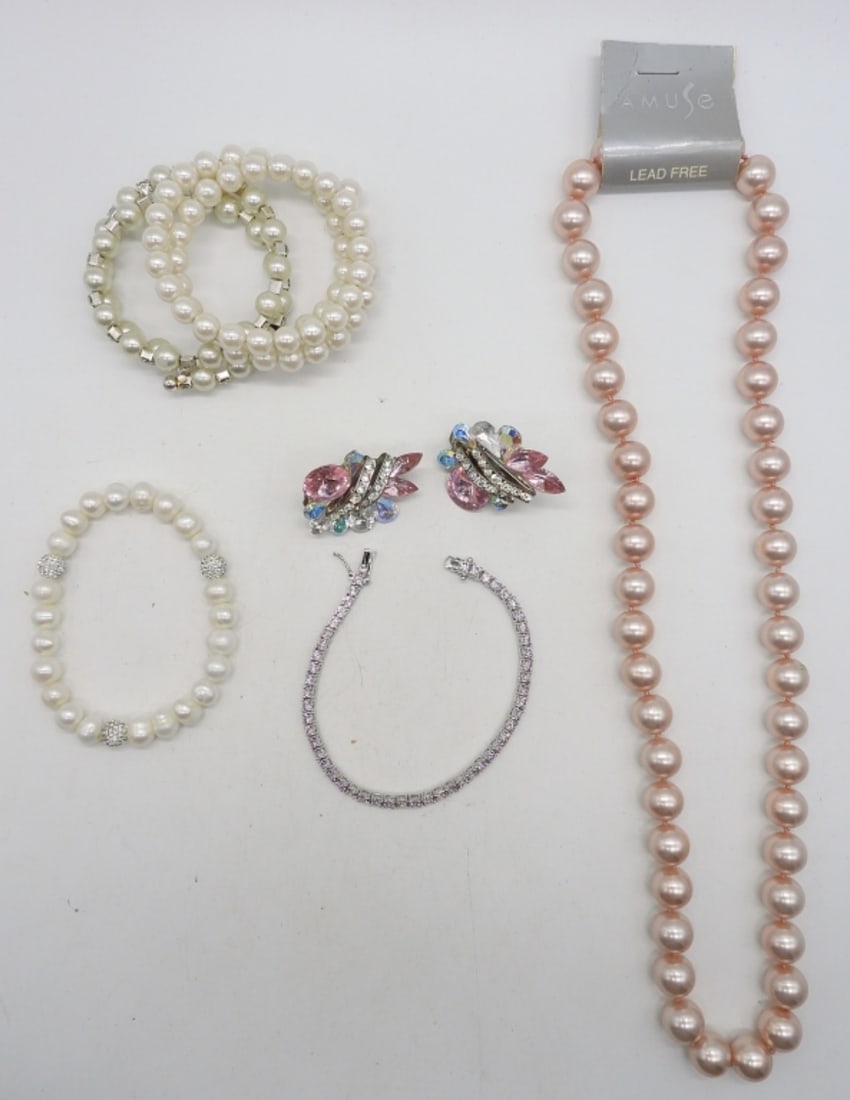 PEARL & RHINESTONE BRACELETS + MORE: PINK FAUX PEARL NECKLACE, 24". 3 FAUX PEARL BRACELETS, STRETCHY. ONE PINK RHINESTONE BRACELET, 7". PIERCED RHINESTONE EARRINGS.