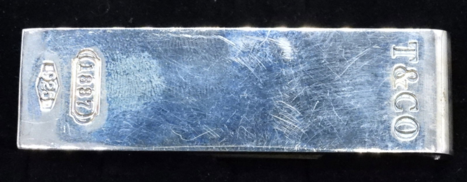 TIFFANY & CO STERLING MONEY CLIP: TIFFANY & CO STERLING SILVER MONEY CLIP. SEE PHOTOS FOR MARKING. .75" x 2.5". (15.5 DWT)