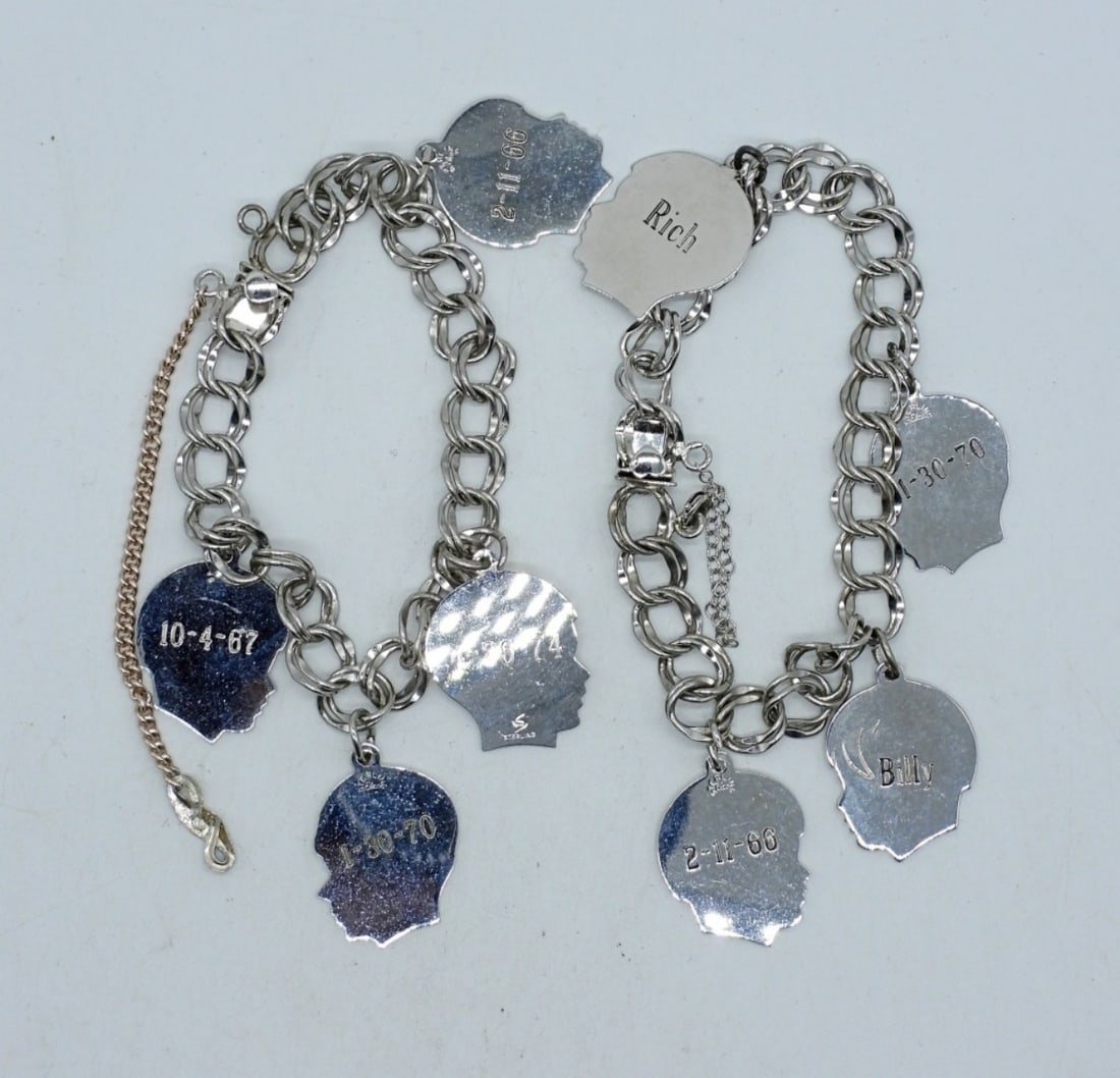 (2) STERLING CHARM BRACELETS: TWO STERLING CHARM BRACELETS. CIRCA 1970's. 6". (27.8 DWT)