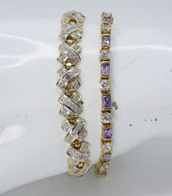TWO STERLING FASHION BRACELETS