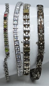 FOUR STERLING FASHION BRACELETS