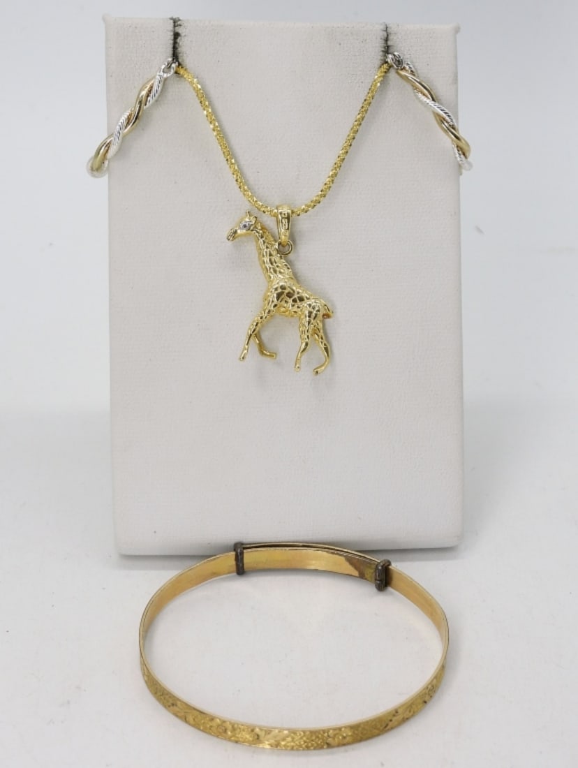 STERLING GOLD TONE GIRAFFE NECKLACE +: STERLING GOLD TONE GIRAFFE PENDANT ON A 18" CHAIN. STERLING & GOLD TONE PIERCED HOOP EARRINGS. SMALL 1/20 12K GP OVER 925 BRACELET, ADJUSTABLE 6-7". (8.7 DWT)