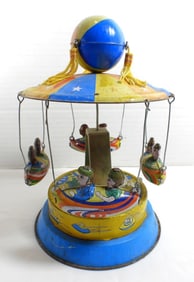 VINTAGE TIN TOY CAROUSEL