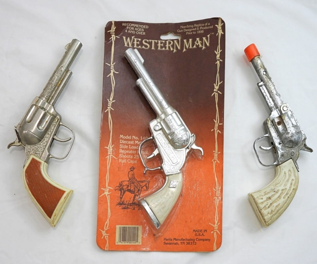 (3) COWBOY CAP GUNS (1) NEW in PACK: WESTERN MAN MODEL NO 140 CAP GUN NEW in PACKAGE, (1) GABRIEL working (1) with ORANGE TIP for REPAIR