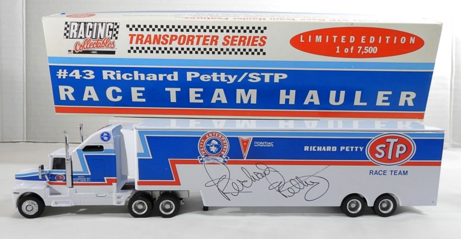 #43 RICHARD PETTY AUTO RACE TEAM HAULER LE: 1:64, AUTOGRAPH IS UNVERIFIED, LIMITED EDITION 1 OF 7,500 FROM RACING COLLECTABLES INC. TRANSPORTER SERIES, #43 RICHARD PETTY/STP, STILL IN ORIGINAL BOX, DOES HAVE A COA FROM RACING COLLECTABLES INC.