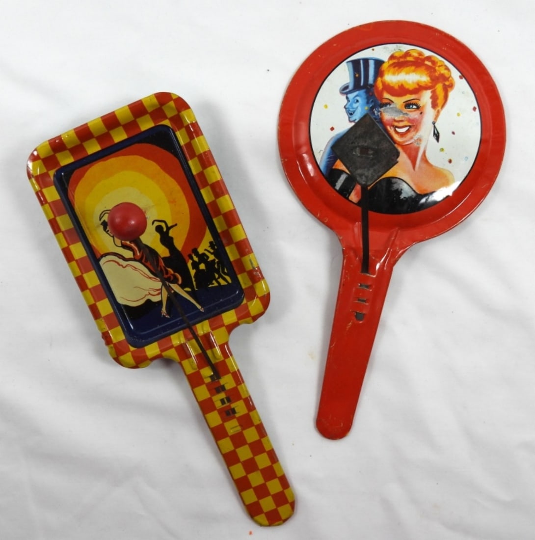 1940- NEW YEARS EVE TIN PARTY PADDLE: VINTAGE TIN NEW YEARS EVE TIN PARTY PADDLE- IN FAIR TO GOOD CONDITION (DOES SHOW WEAR ON HER FACE) PREOWNED.1940'S ERA TIN TOY PADDLE NOISE MAKER IN GOOD CONDITION. DOES SHOW WEAR. PREOWNED.