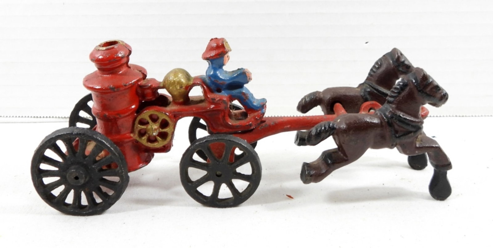 CAST IRON FIREMAN FIRE PUMPER WAGON: VINTAGE CAST IRON FIREMAN FIRE PUMPER WAGON HORSE DRAWN FIRE TRUCK TOY (2 PIECE )