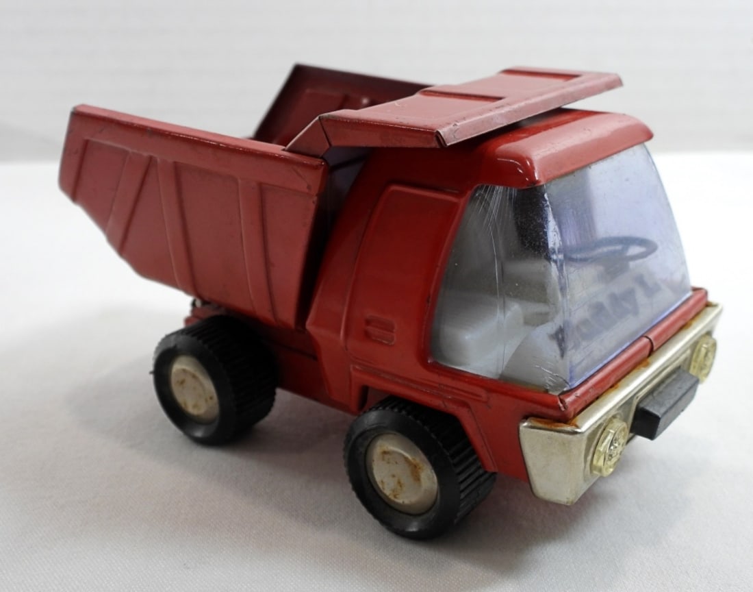 BUDDY L JR. RED MINI DUMP TRUCK: ABOUT 5IN LONG BUDDYL IN THE FRONT