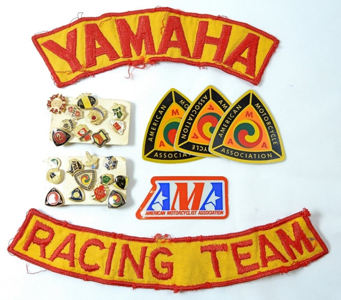 AMERICAN MOTORCYCLE ASSOC LOT: YAMAHA RACTING TEAM & PINS AMA & STICKERS