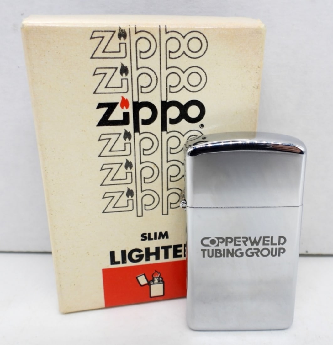 1981 UNFIRED SLIM ZIPPO ADVERTISING: ADVERTISING- COPPERWELD TUBING GROUP, IN A ZIPPO BOX, UNFIRED