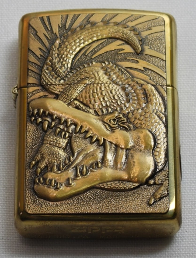 1996 SEALED BARRETT-SMYTHE CROCODILE ZIPPO: 1996, IN ORIGINAL ZIPPO BOX, SOILD BRASS WINDPROOF