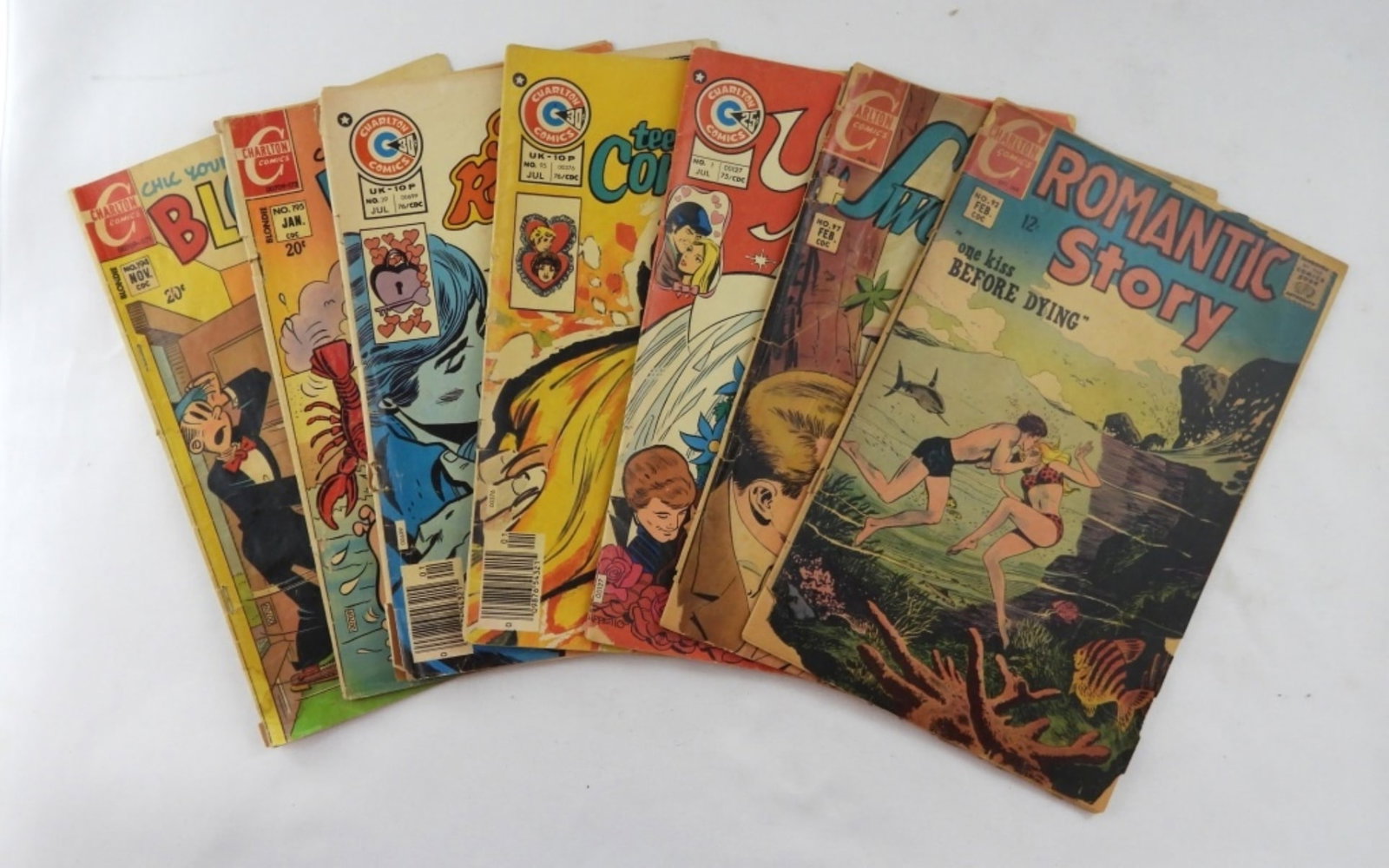 (7) CHARLTON ROMANTIC LOT-1968-1976: ROMANTIC STORY NO 92. SWEETHEARTS- NO 97. YOUNG BRIDES NO 1. TEEN CONFESSIONS NO 95. SECRET ROMANCE NO 39. BLONDIE #194-194. ALL ARE IN FAIR TO GOOD CONDITION, THEY ALL SHOW WEAR, ALL PREOWNED.