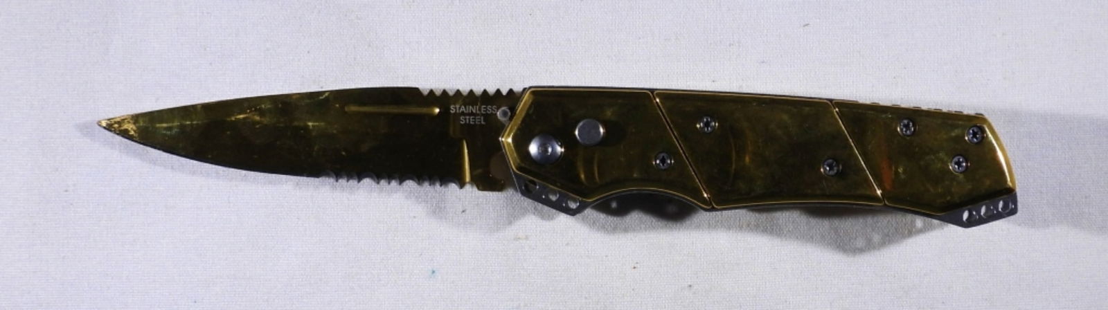 GOLD TONE SPRING ACTION SWITH KNIFE (1 of 2)