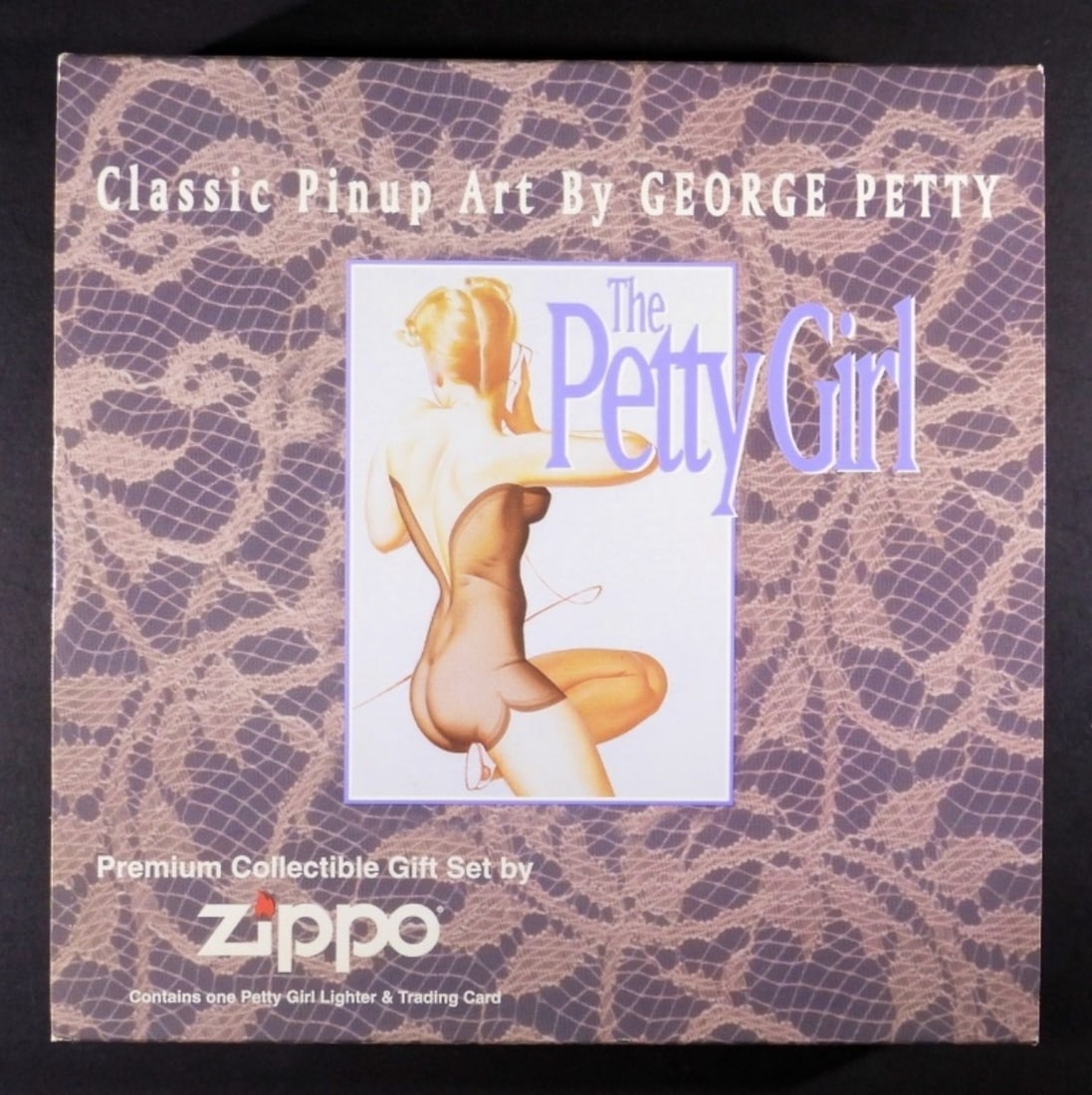 THE PETTY GIRL ZIPPO HEART VALENTINE W/TRADING CAR: 1996, UNFIRED ZIPPO FROM CLASSIC PINUP ART BY GEORGE PETTY COLLECTION, VALENTINE HEART PINUP GIRL, TRADING CARD COMES WITH IN ORIGINAL BOX ALONG WITH COA FROM ZIPPO NO. 75578