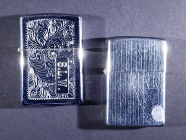 (2) FIRED ZIPPO LIGHTERS 1991 & 1975
