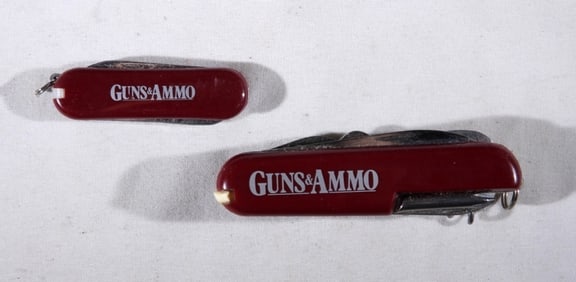 (2) MULTI-FUNCTION KNIVES "GUNS & AMMO"