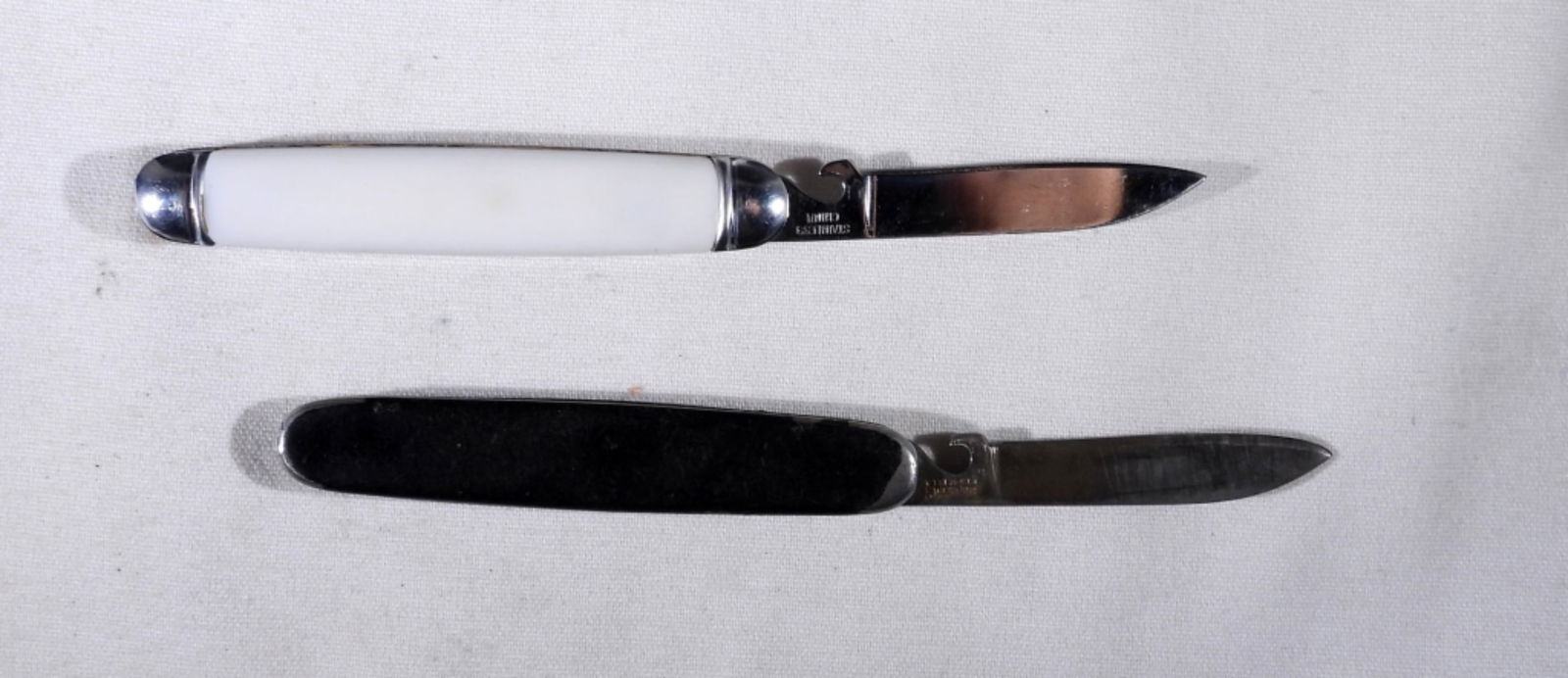 (2) SINGLE BLADE SPRING OPENS KNIVES (1 of 2)