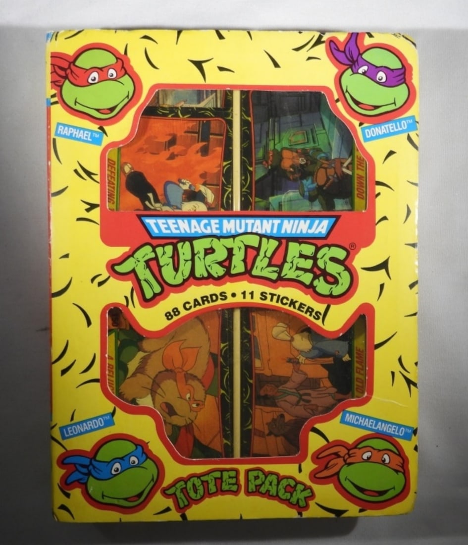 1989 TOPPS TMNT TOTE PACK TRADING CARDS: 1989 TOPPS TEENAGE MUTANT NINJA TURTLES TOTE PACK OF TRADING CARDS & STICKERS. ALL 11 STICKERS ARE HERE, AND 83 CARDS.