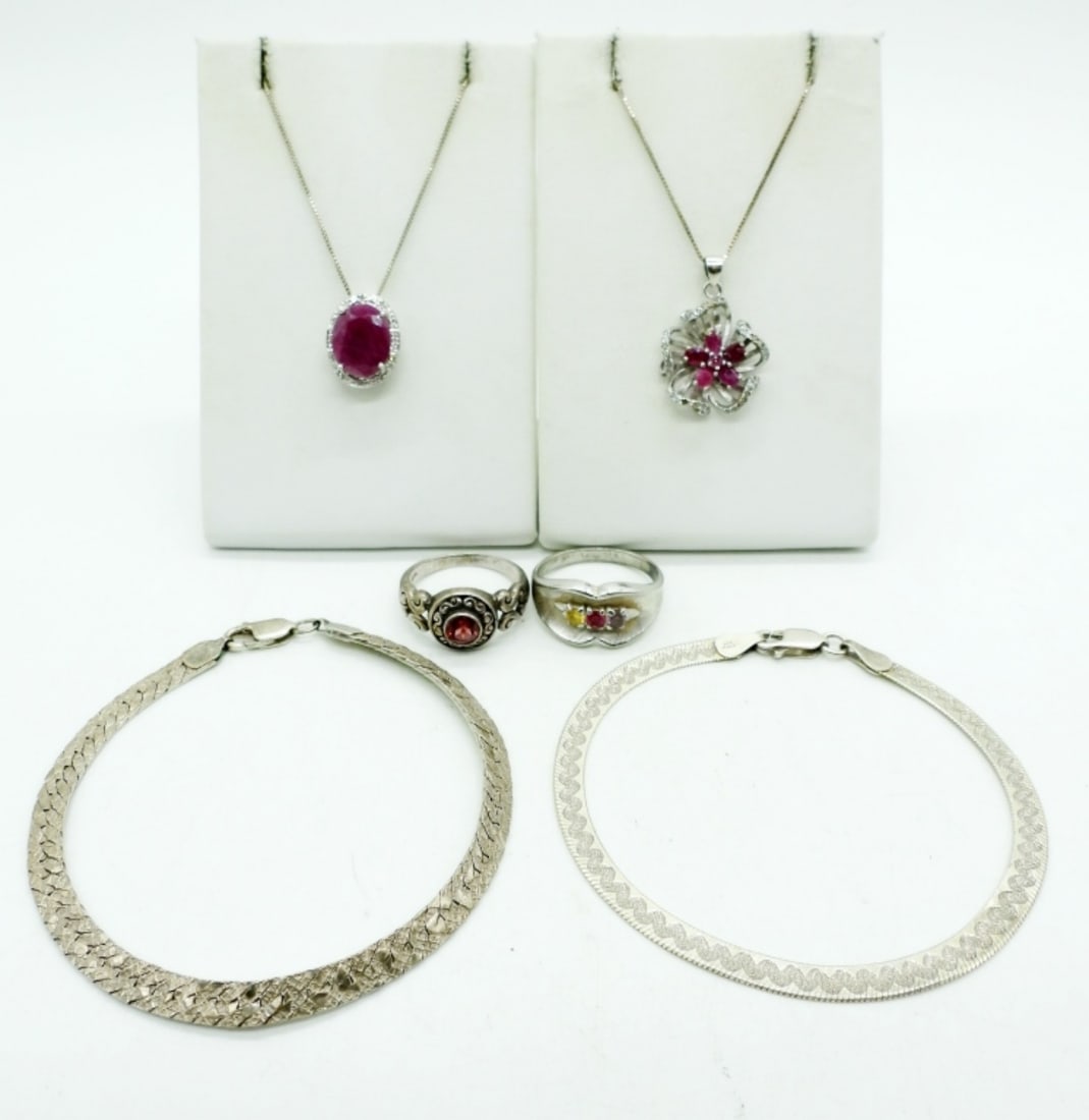 RUBY NECKLACES, STERLING BRACELETS-RINGS: TWO STERLING RUBY NECKLACES, BOTH 18". TWO STERLING CHAIN BRACELETS, 7.5". TWO STERLING RINGS WITH GEMSTONES, SIZES 8 & 8.5 (17.2 DWT)