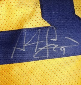 ADAM PACMAN JONES SIGNED W.V. JERSEY