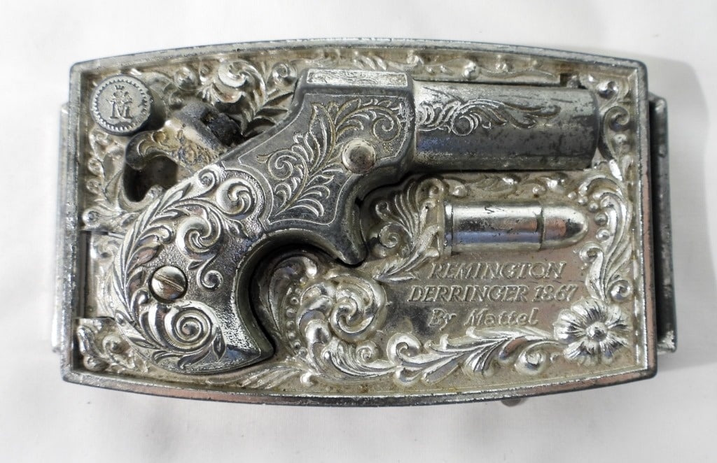 VINTAGE 1959 MATTEL TOY REMINGTON BUCKLE: 1867 DERRINGER PISTOL CAP GUN BUCKLE, GUN REMOVES FROM THE BUCKLE, NO TOY BULLET