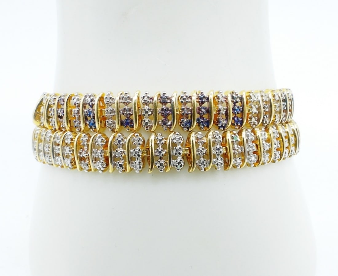 STERLING GOLD TONE TENNIS BRACELETS: TWO STERLING GOLD TONE TENNIS BRACELETS, 7.5". (17.4 DWT)