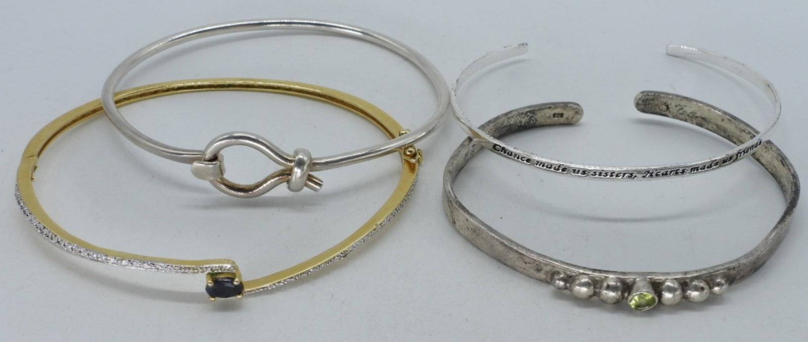 (4) STERLING FASHION BRACELETS: FOUR STERLING FASHION BRACELETS. PERIDOT, SAPPHIRE. 7-8". (23 DWT)