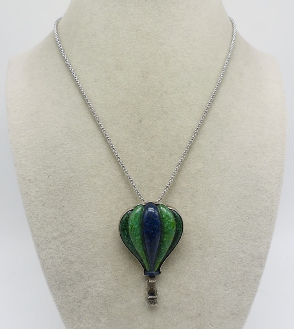 CAROLYN POLLACK HOT AIR BALLOON 925: STERLING CAROLYN POLLACK HOT AIR BALLOON PENDANT / PIN. INLAID GEMSTONES, PROBABLY TURQUOISE & MALACHITE. PENDANT IS 2" LONG. CHAIN IS 16". (9 DWT)