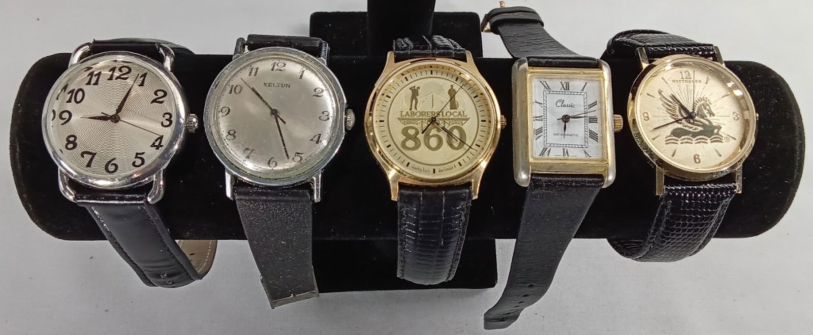 5 MENS BLACK BAND WATCHES: WATCHES ARE NOT VERIFIED, AUTHENTICATED, OR TESTED IN RUNNING CONDITION UNLESS SPECIFIED, INCLUDING KELTON, WITTNAUER, HAMILTON, AND MORE