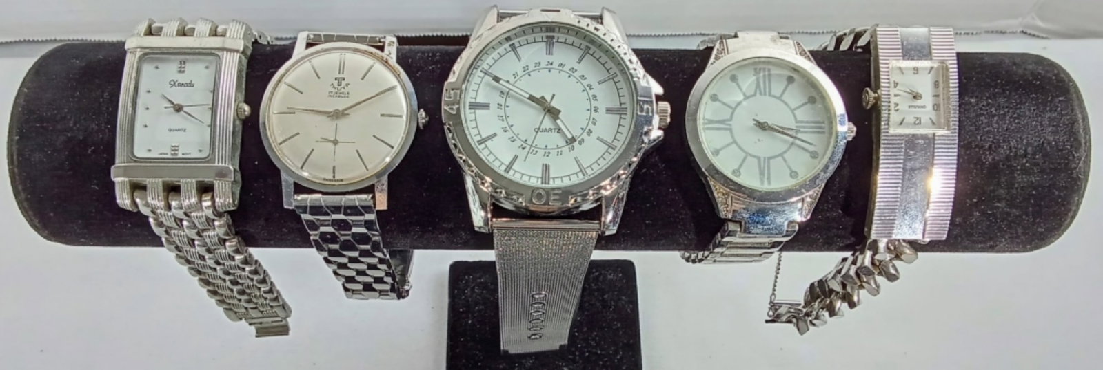 5 MENS SILVER TONE WATCHES: WATCHES ARE NOT VERIFIED, AUTHENTICATED, OR TESTED IN RUNNING CONDITION UNLESS SPECIFIED, INCLUDING THUYA, CARRVELLA, XANADU, AND MORE