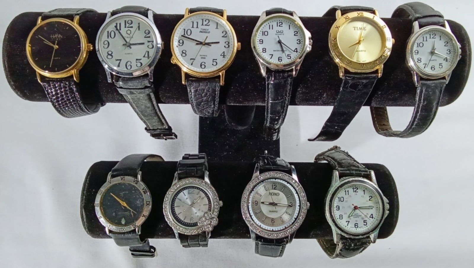 (10) MIXED LOT LG LADIES BLACK BANDS: WATCHES ARE NOT VERIFIED, AUTHENTICATED, OR TESTED IN RUNNING CONDITION UNLESS SPECIFIED, INCLUDING TIMEX, XOXO, HANA, & MORE