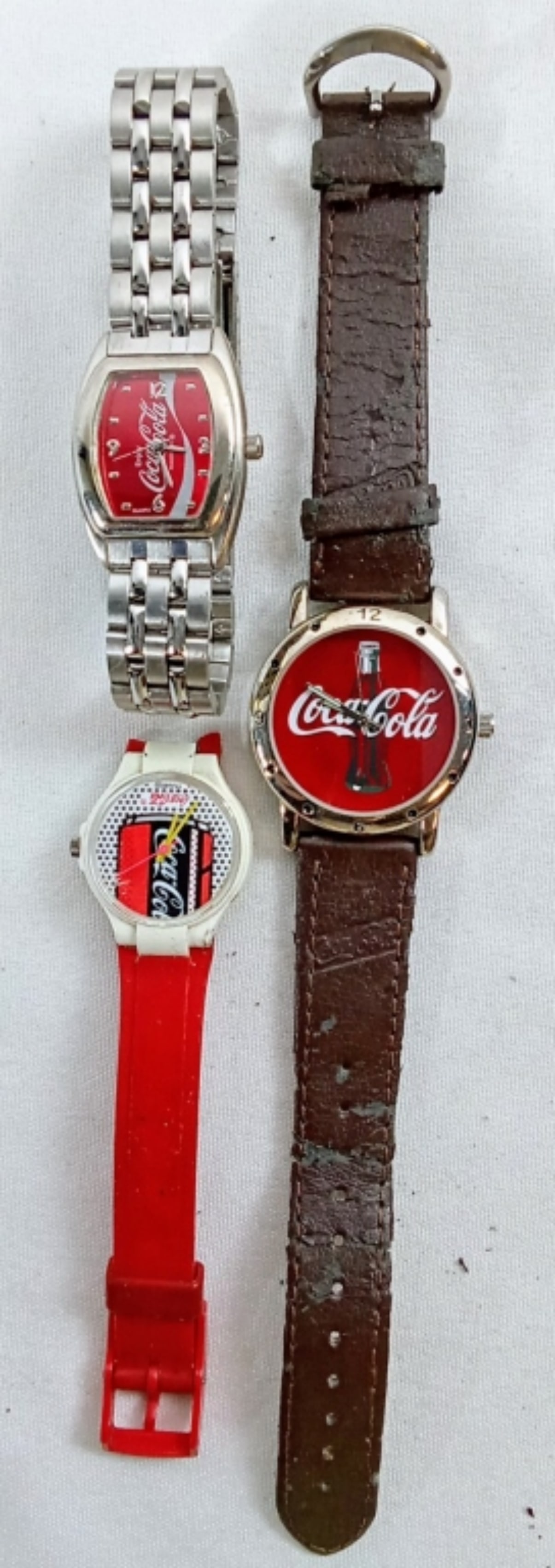 (3) COCA-COLA WATCH LOT - QUARTZ: (1) MISSING PART OF BAND - Watches are not verified, authenticated, or tested in running condition unless otherwise specified.
