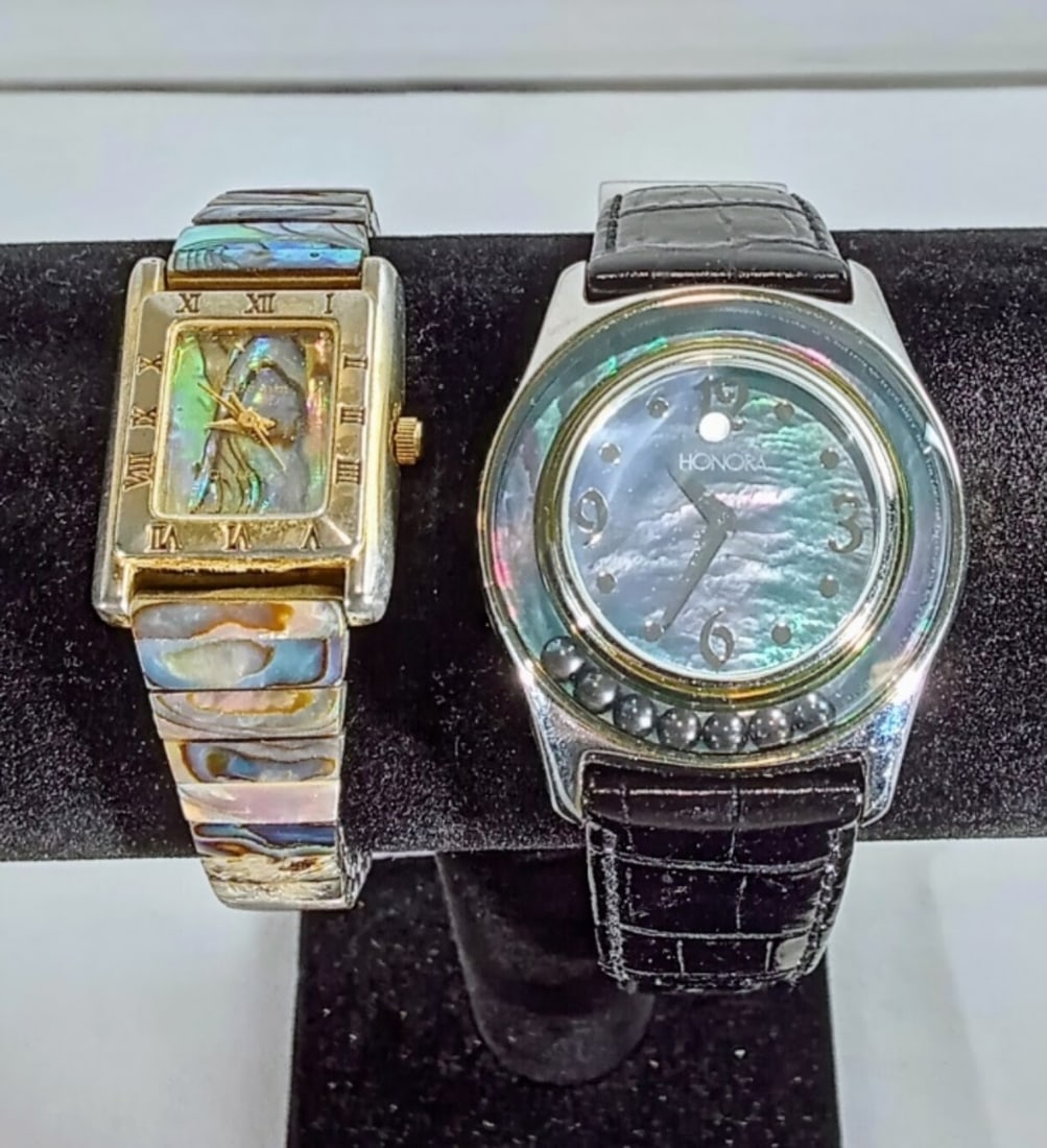 (2) MOTHER OF PEARL WATCHES - HONORA: PEARLS MOVE AROUND DIAL & ABALONE STRETCH BAND - Watches are not verified, authenticated, or tested in running condition unless otherwise specified.