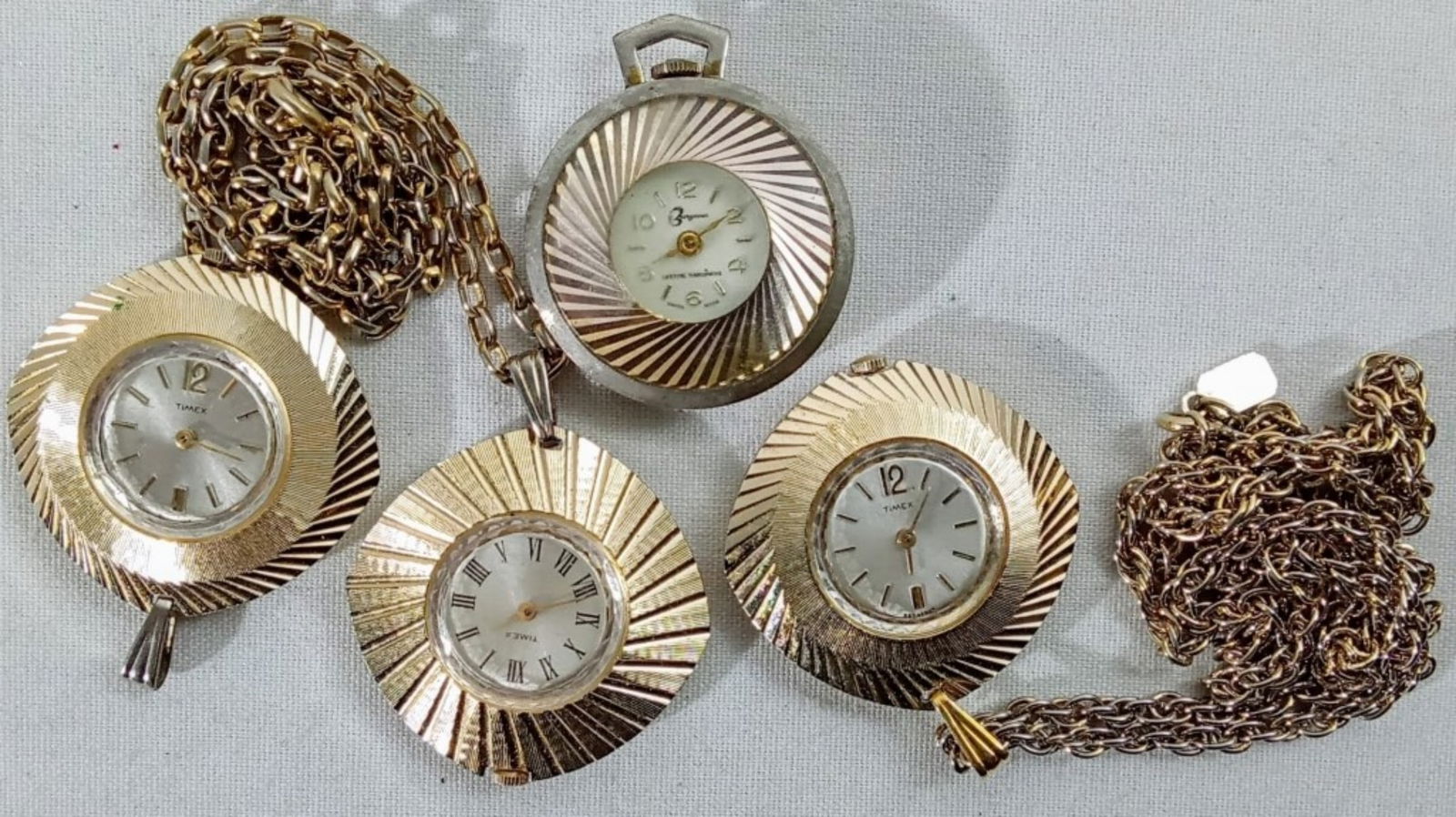 (4) PENDANT WATCHES: WATCHES ARE NOT VERIFIED, AUTHENTICATED, OR TESTED IN RUNNING CONDITION UNLESS SPECIFIED, INCLUDING 3 TIMEX & MORE