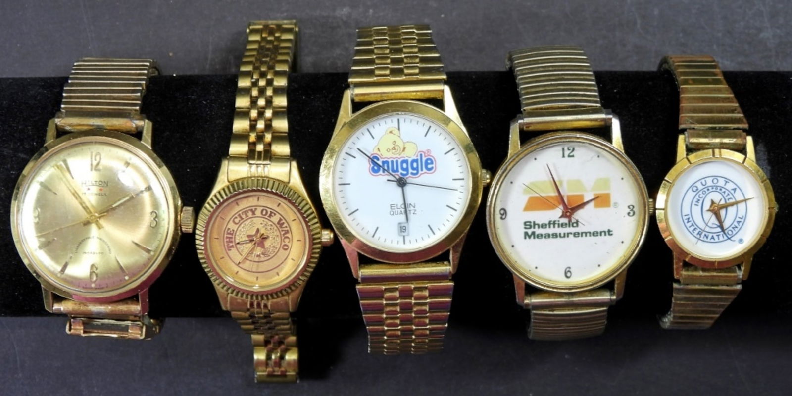 (5) ASSORTED GOLD BRANDED WATCHES: 5 assorted gold band watches from various companies, untestest as to working or not, most will need battery replacements, some for parts or repair, some may not work, various sizes