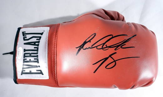 Riddick Bowe Autographed Boxing Glove: Signed on a Everlast boxing glove, with JSA sticker only on glove #WA425609