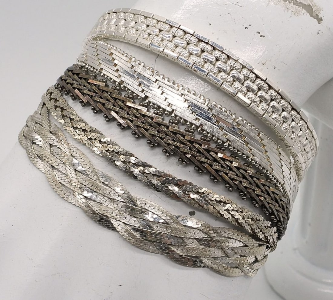 (5) STERLING CHAIN BRACELETS: FIVE STERLING CHAIN BRACELETS. 7-7.5" (38 DWT)