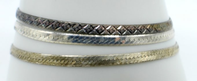 THREE STERLING BRACELETS