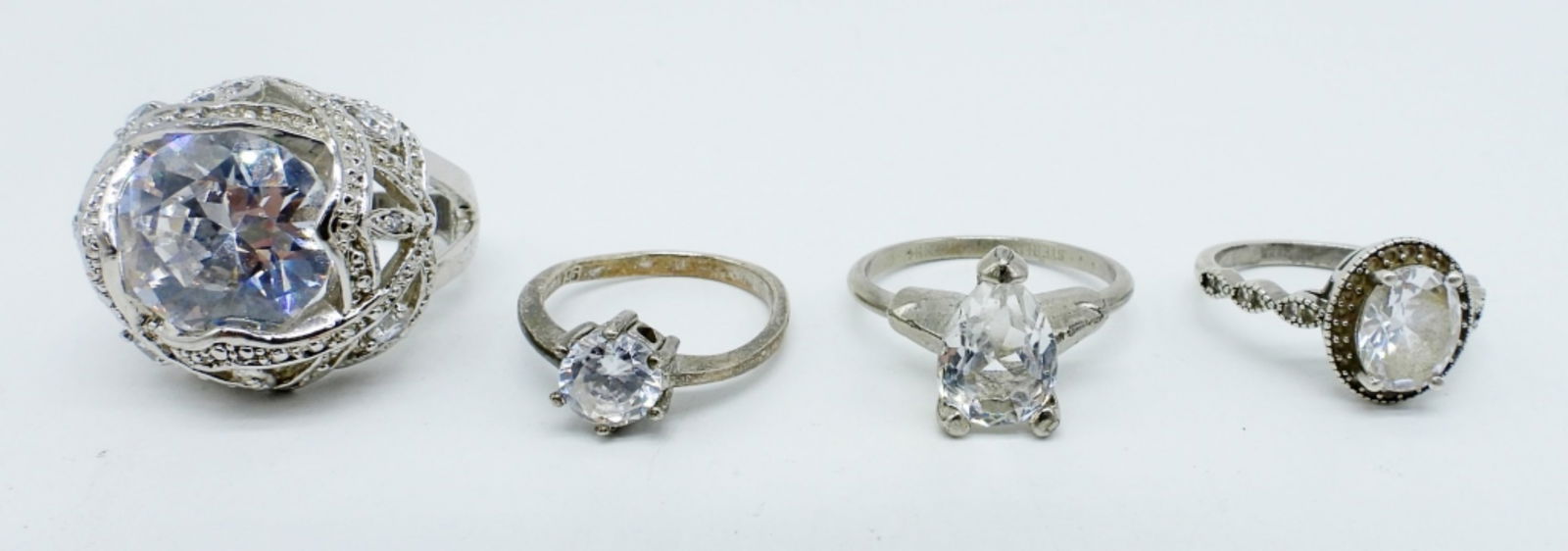 (4) STERLING BRIDAL STYLE RINGS (1 of 5)